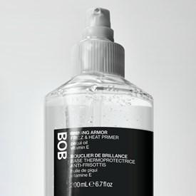 BACK OF BOTTLE SHINING ARMOR FRIZZ & HEAT PRIMER 6.7 Fl. Oz.